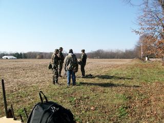 Militia members in a field